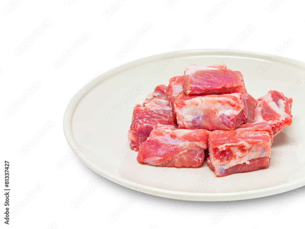 pork sparerib raw in dish isolated on white background pork sparerib raw in dish isolated on white background