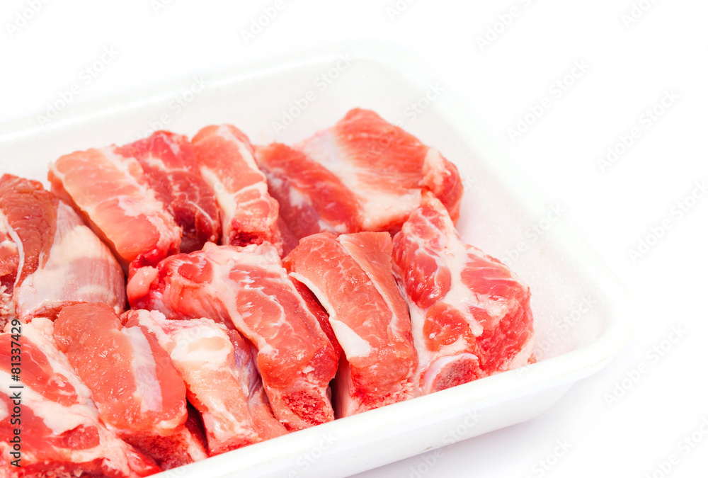 pork sparerib raw in tray foam isolated on white background pork sparerib raw in tray foam isolated on white background