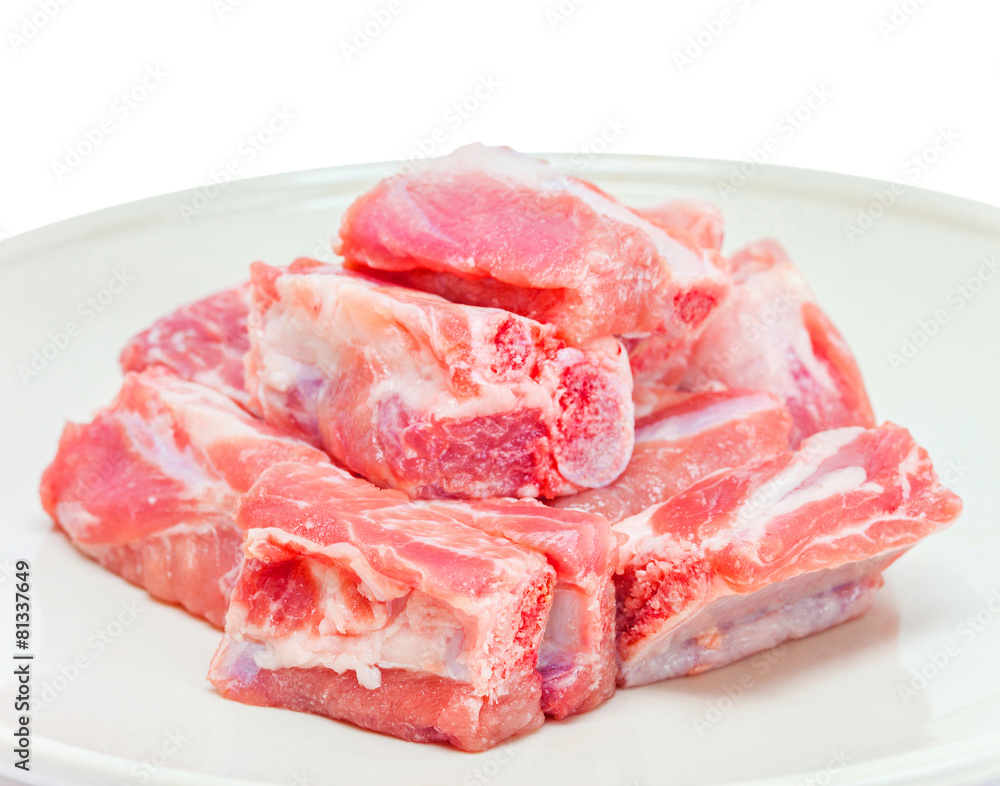 pork sparerib raw in dish isolated on white background pork sparerib raw in dish isolated on white background