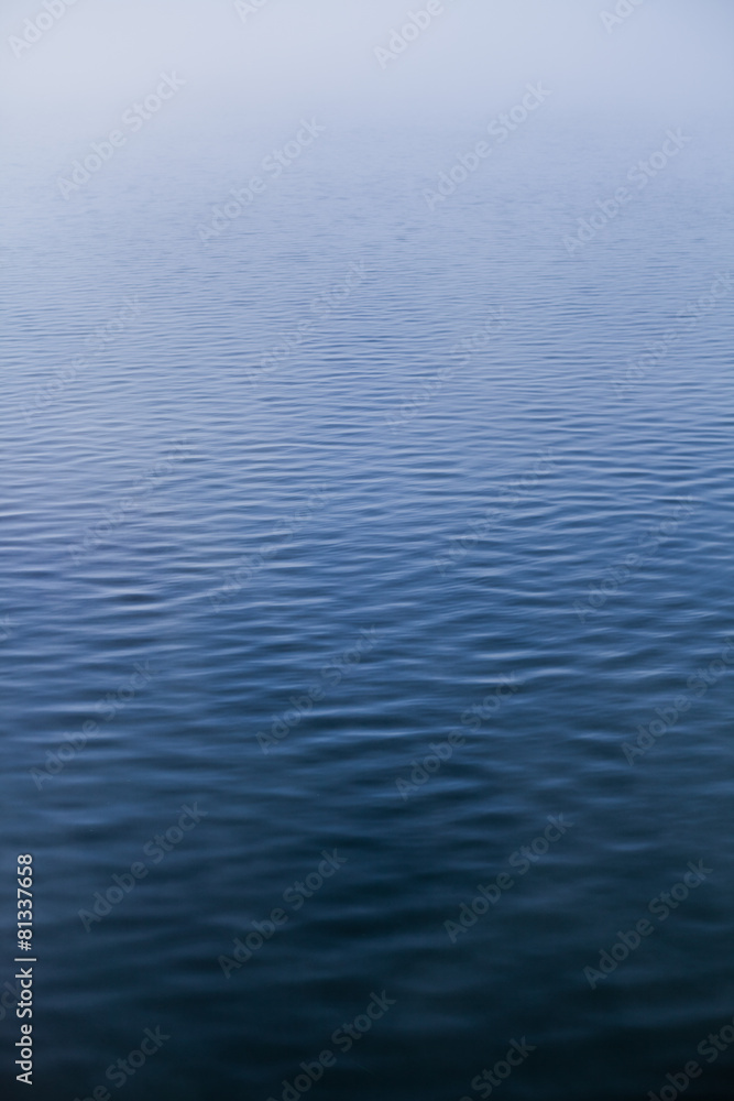 Calm Water texture on a Foggy Morning Calm Water texture on a Foggy Morning