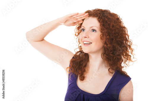 Attractive wondering woman looking at something far away