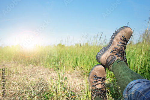 Man resting after hiking excursion in the nature