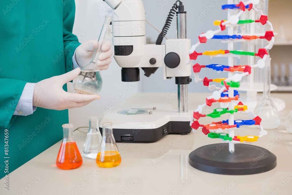 Fototapeta premium Scientist examining precipitate