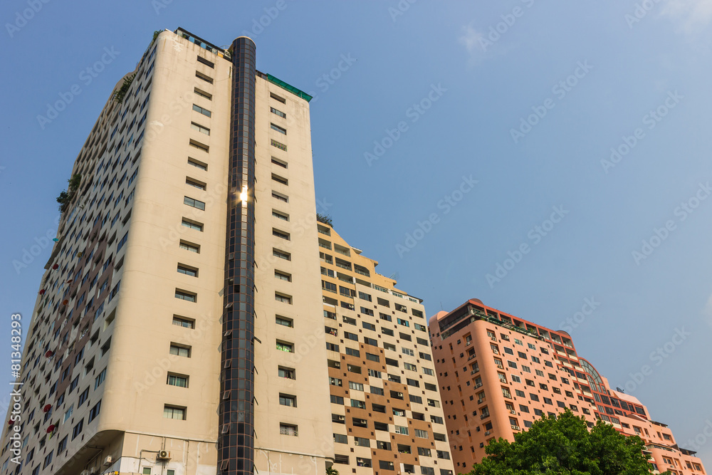 Condominium building on blue sky