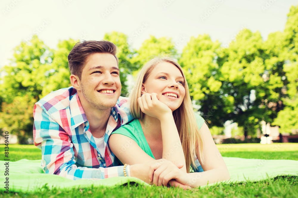 smiling couple in park smiling couple in park