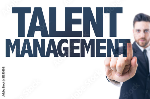 Business man pointing the text: Talent Management