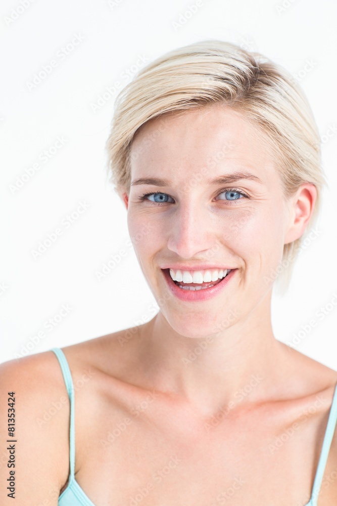 Beautiful blonde woman smiling at camera Beautiful blonde woman smiling at camera