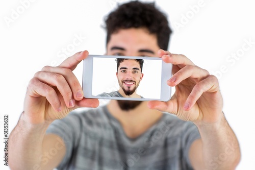 Photos Casual man taking a selfie