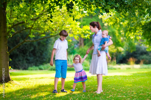 Mother and children in a park