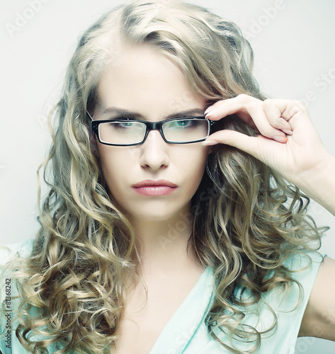 blond woman with glasses