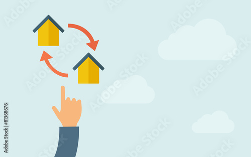 Hand pointing to little houses with arrow