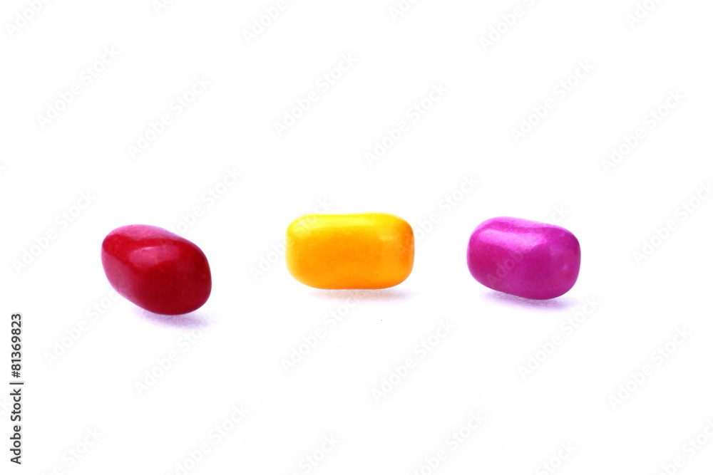 Studio shot of coloured pills on white background