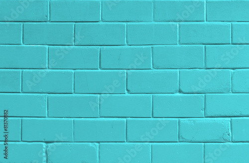 Abstract blue background with old brick wall