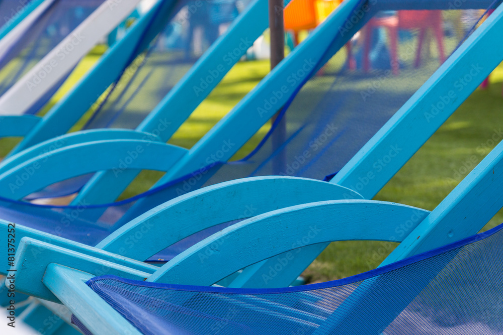 blue and white wooden beach chair