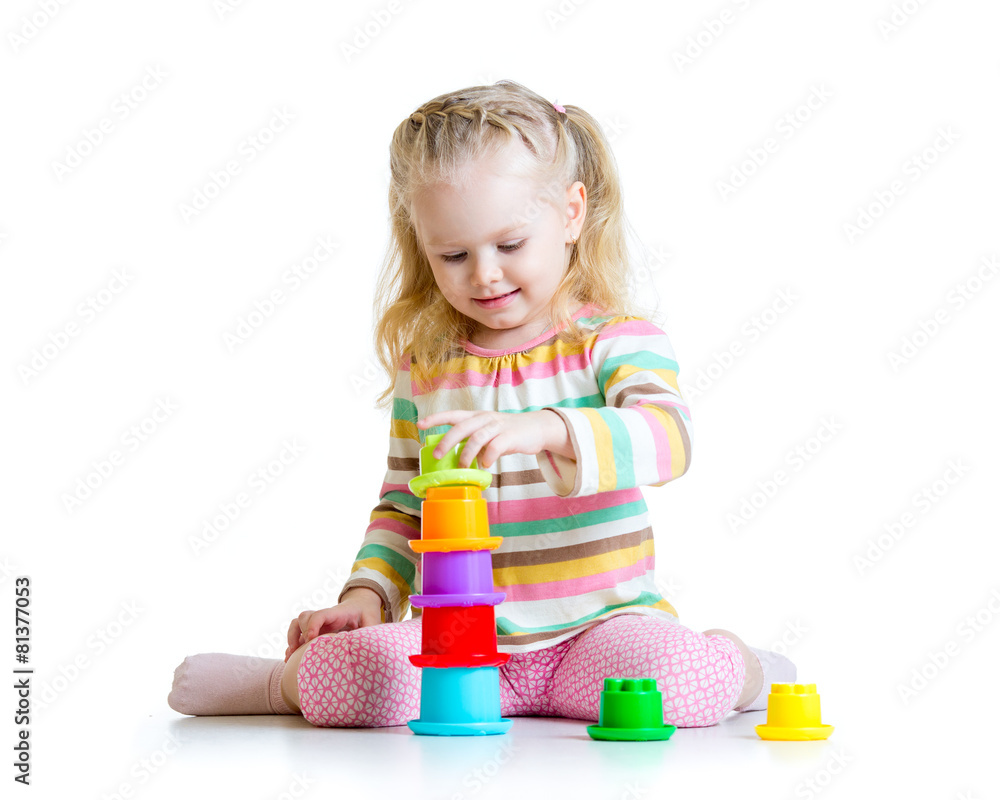 little girl playing with toys Stock Photo | Adobe Stock