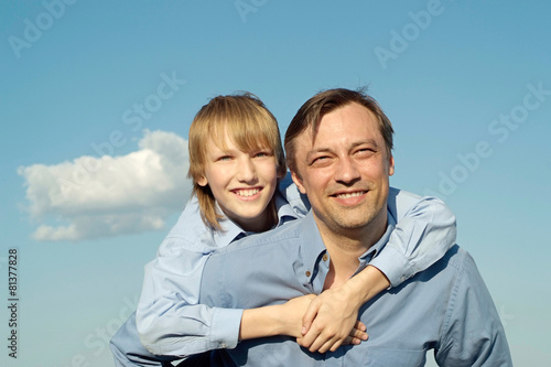 cheerful father and son