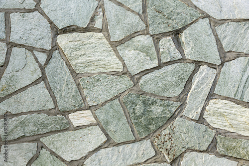 section of flagstone wall with varying shapes and lines