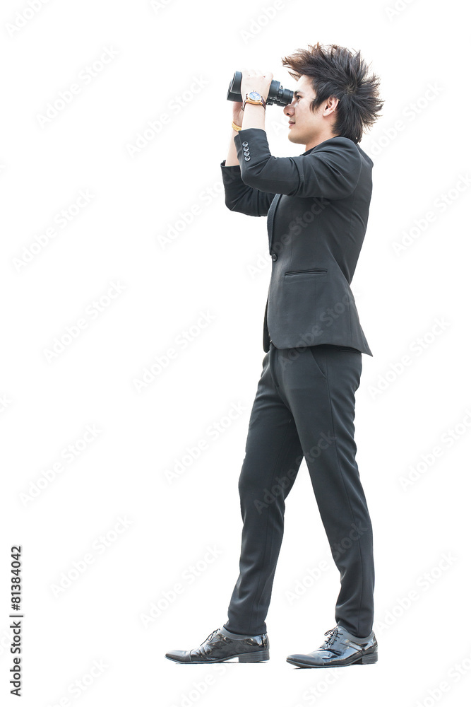 Businessman search stock through binoculars