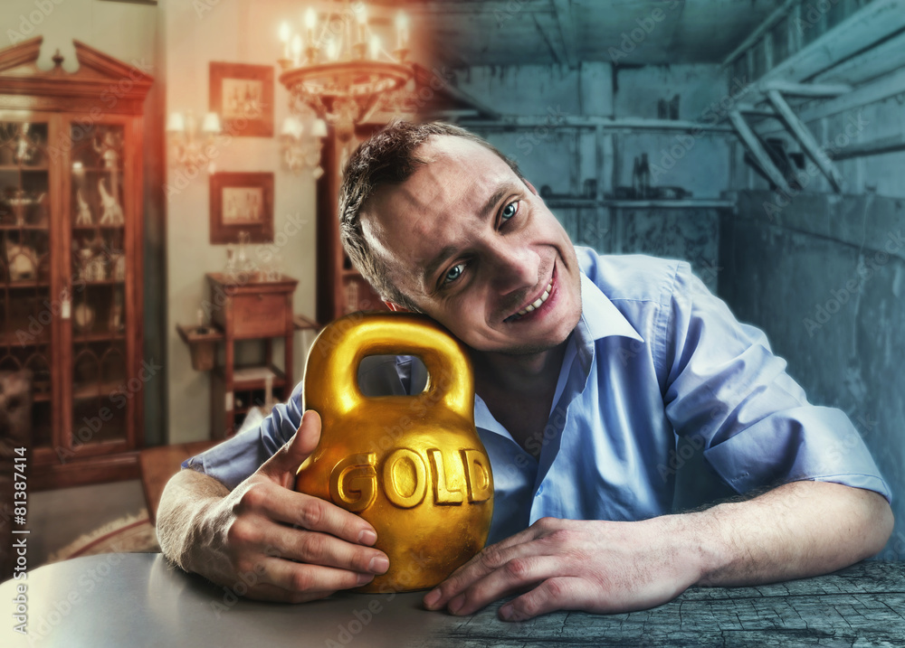Happy man with a gold kettlebell Happy man with a gold kettlebell