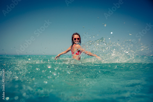 Young woman in the sea © Sunny studio