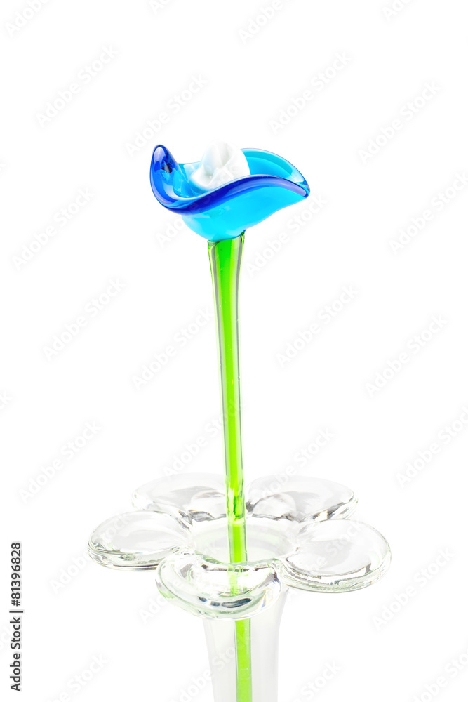 Flower made of glass in red and blue color in vase on white back Flower made of glass in red and blue color in vase on white back