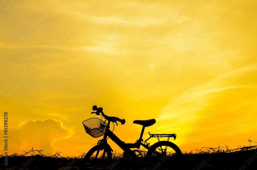 Mountain bike silhouette in sunrise