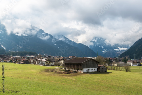 Mayrhofen, Austria with low clouds covering mountains © beataaldridge