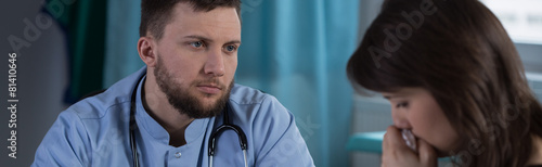 Resigned patient at doctor's office