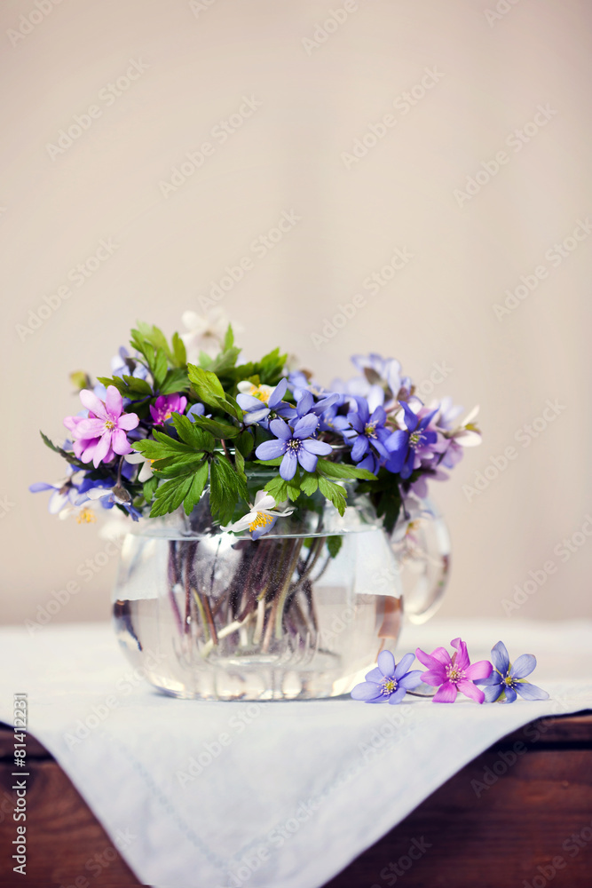 Glass vase with fresh spring forest flowers Glass vase with fresh spring forest flowers