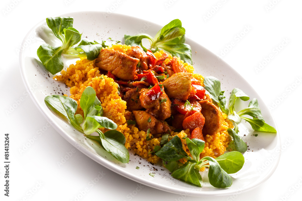 Roasted meat with pearl barley and vegetables on white backgroun Roasted meat with pearl barley and vegetables on white backgroun