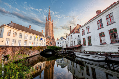 little dock and bridge in a canal of Bruges, Belgium