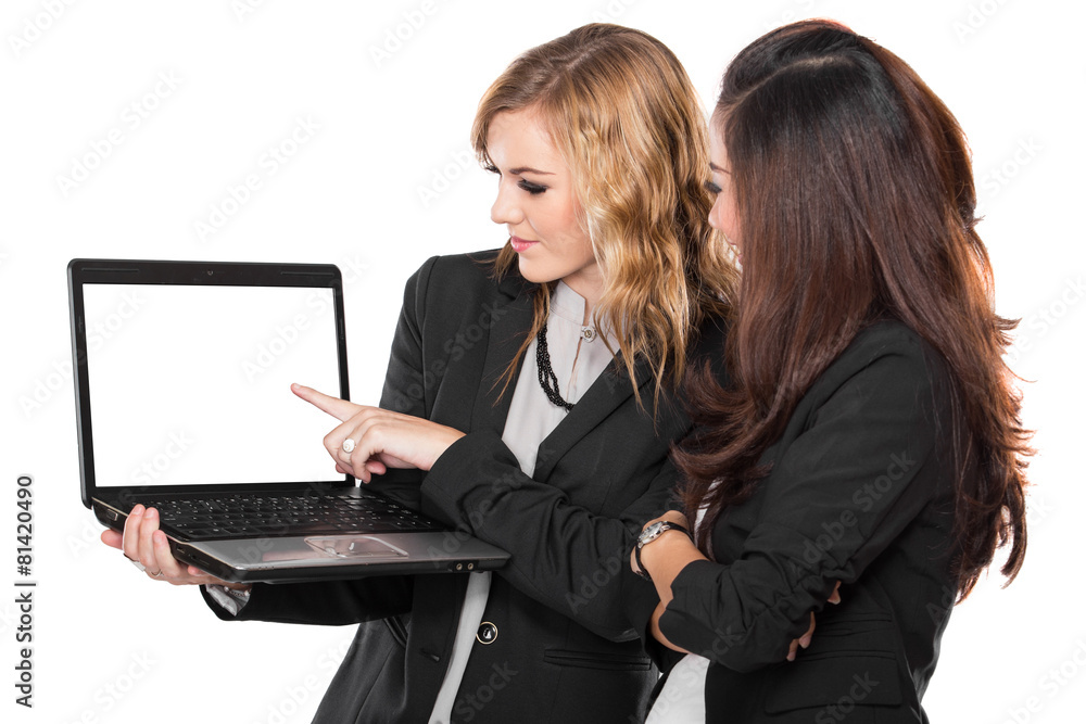 Two businesswoman talking about something on the laptop, isolate Two businesswoman talking about something on the laptop, isolate