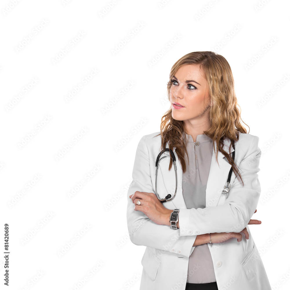 Young female doctor look away with arms crossed, isolated Young female doctor look away with arms crossed, isolated