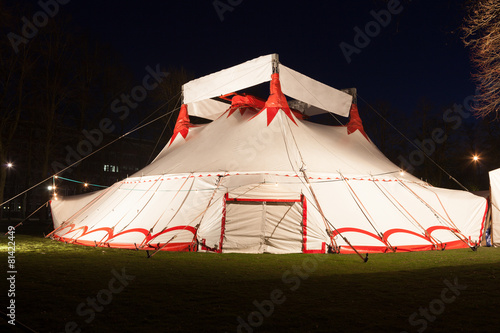 Big top circus tent illuminated at night