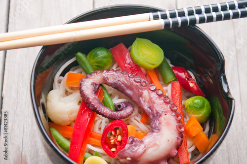 Chinese mix vegetables with pasta and octopus.