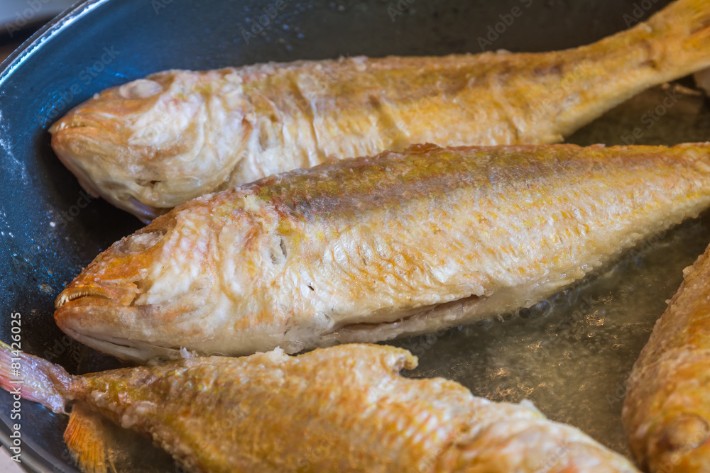 fish fillet cooking on fry pan, food preparation, cooking time