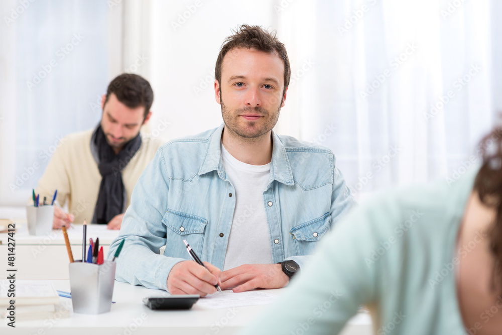 Young attractive man taking exams Young attractive man taking exams