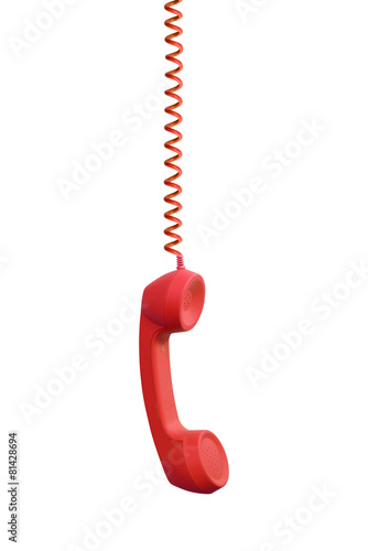 Red phone receiver hanging, isolated on white background