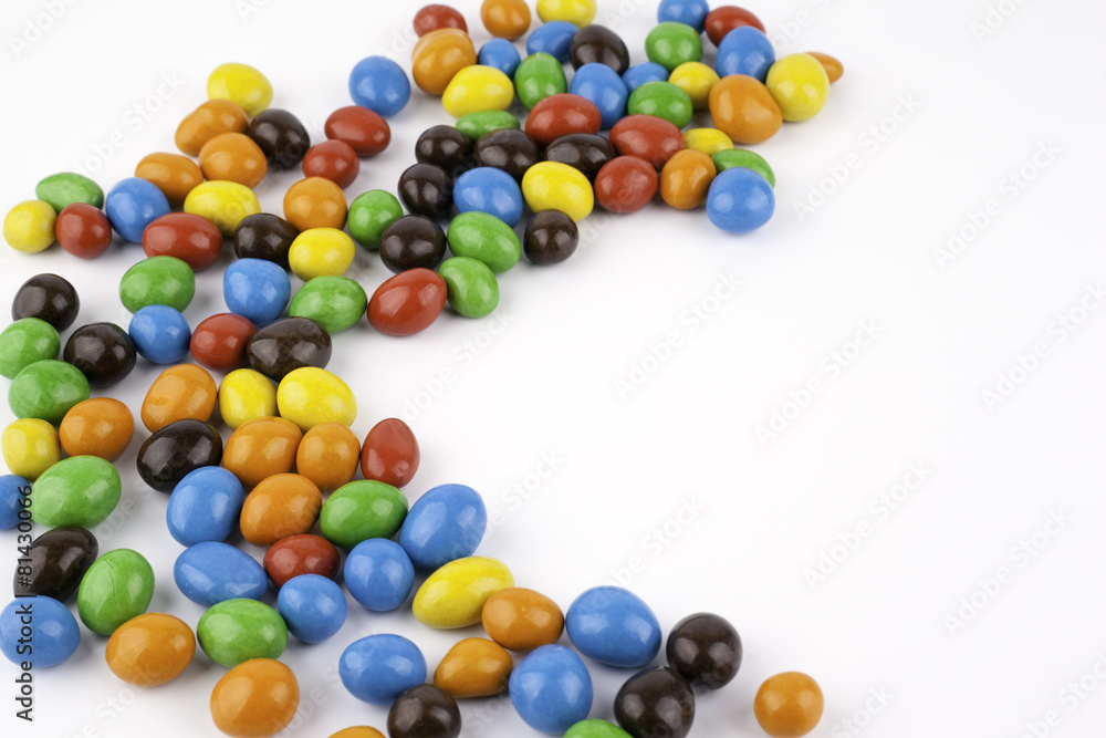 Color dragees with peanuts isolated on white background Color dragees with peanuts isolated on white background