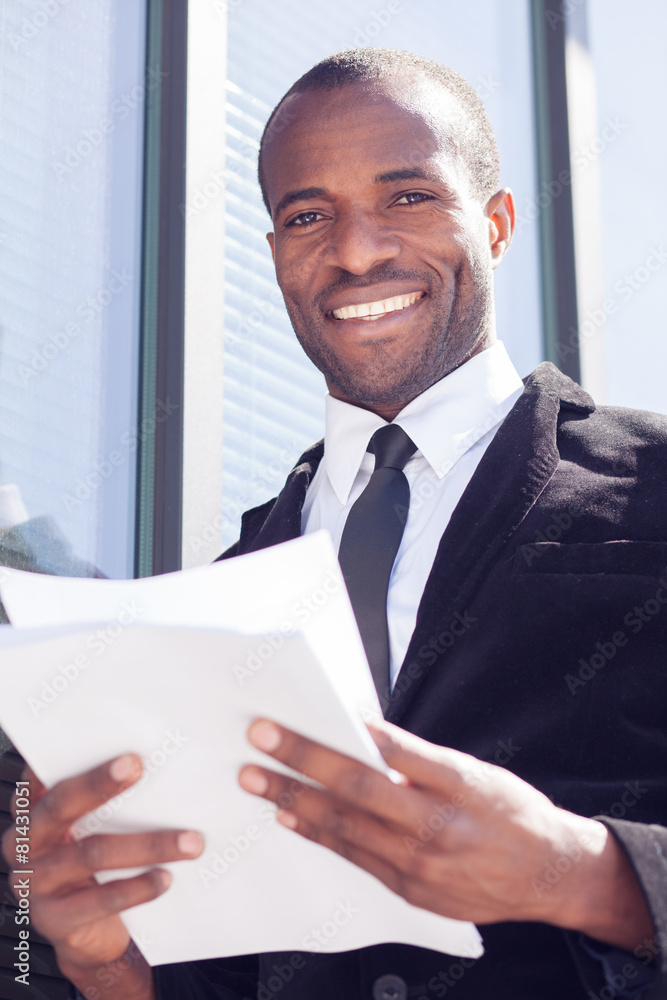 happy black businessman documents handling happy black businessman documents handling
