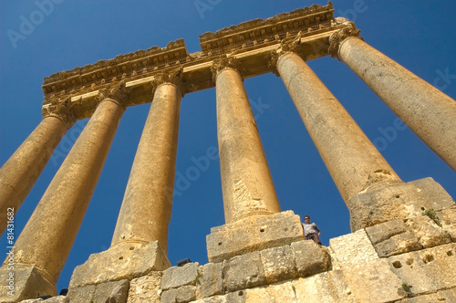 Tourist standing near column of Roman template at Baalbeck © szymanskim