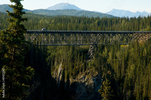 Kuskulana bridge built  1910 seen from a view point, Alaska photo