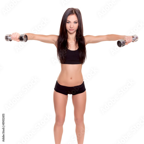 Beautiful young women exercising in a fitness center