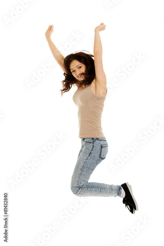 Young casual woman jumping.