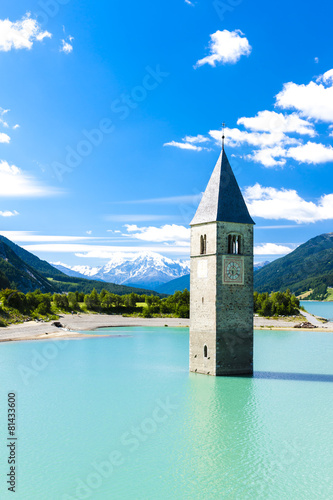 tower of sunken church in Resia lake  South Tyrol  Italy