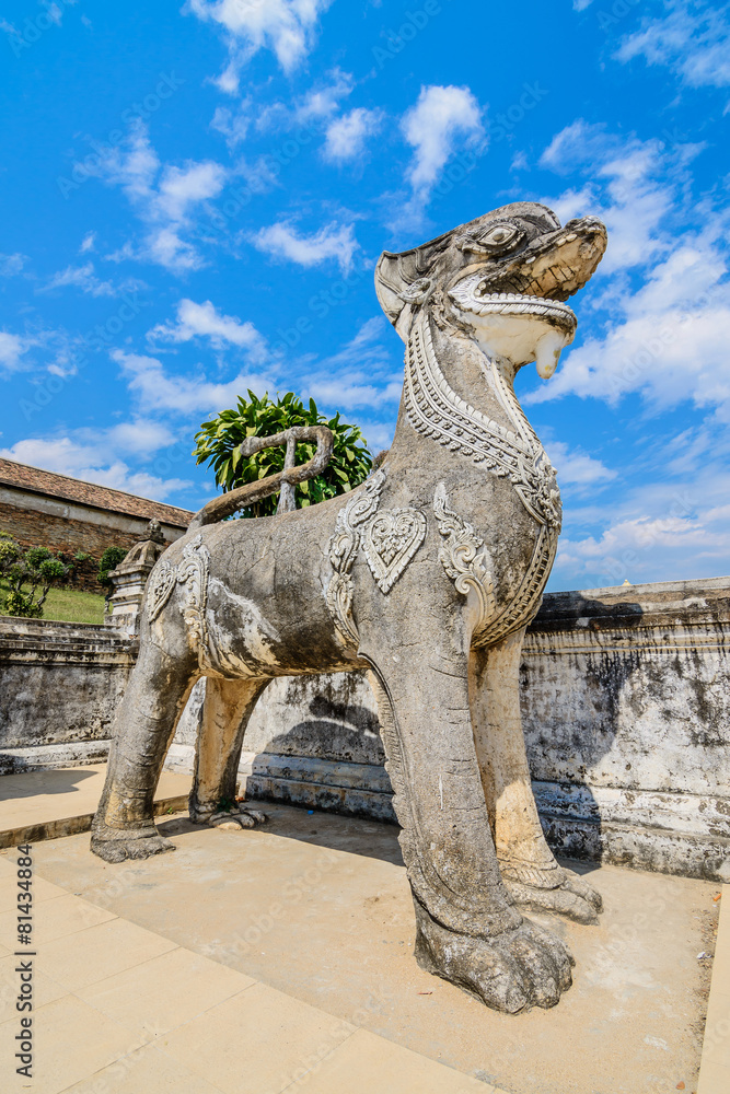 Naklejka premium Singha statue at Wat Prathat Lampang Luang Temple, Lampang, Thai