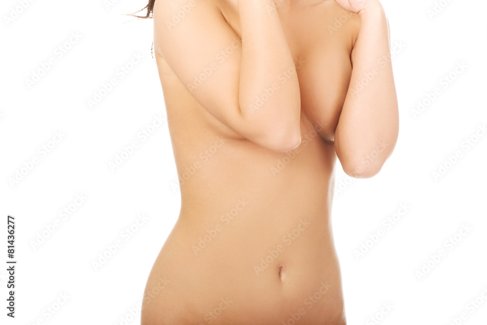 Woman covering her breast. Woman covering her breast.