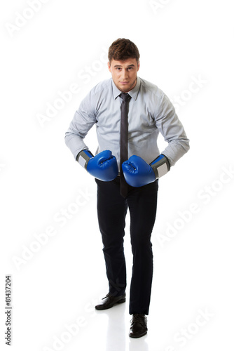 Businessman with boxing gloves.