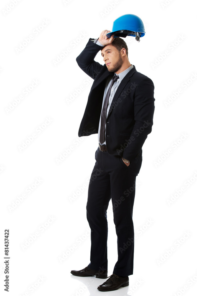 Happy businessman with blue hard hat. Happy businessman with blue hard hat.