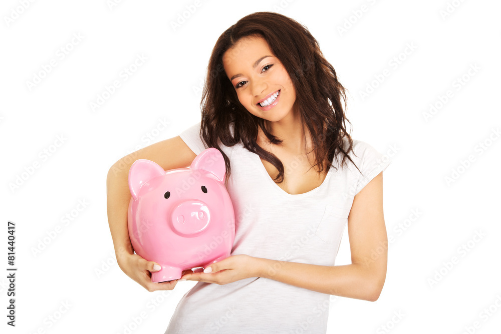 African woman with piggybank. African woman with piggybank.